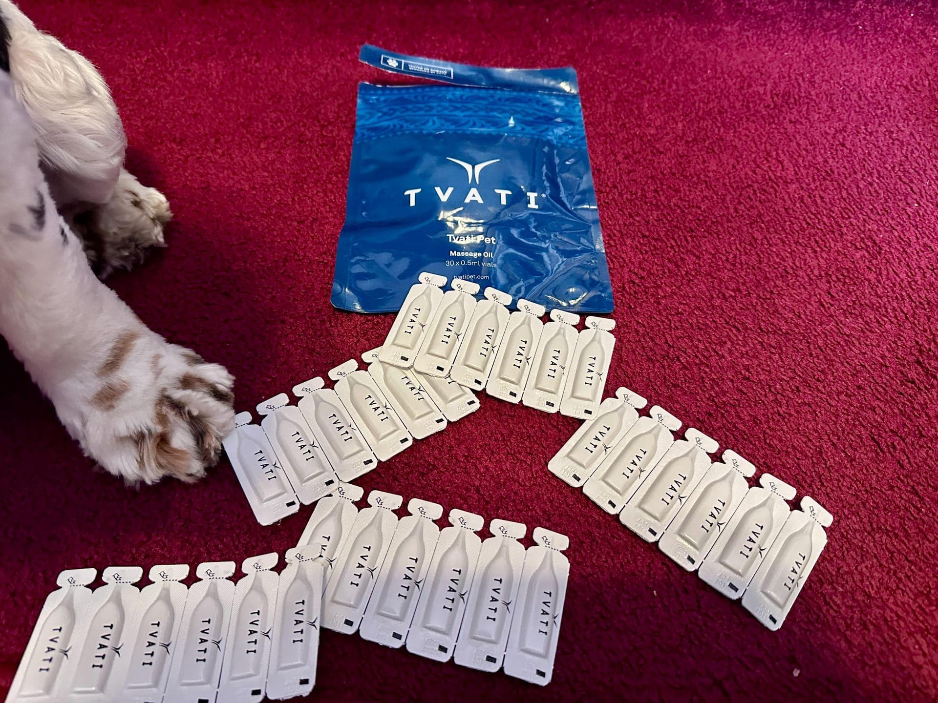 Tvati Pet 30-vial monthly pack laid out with the pouch
