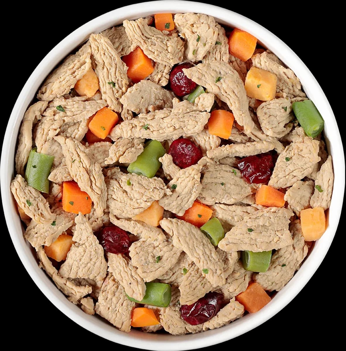 Bowl of Freshpet fresh dog food with chicken, carrots, green beans, and cranberries