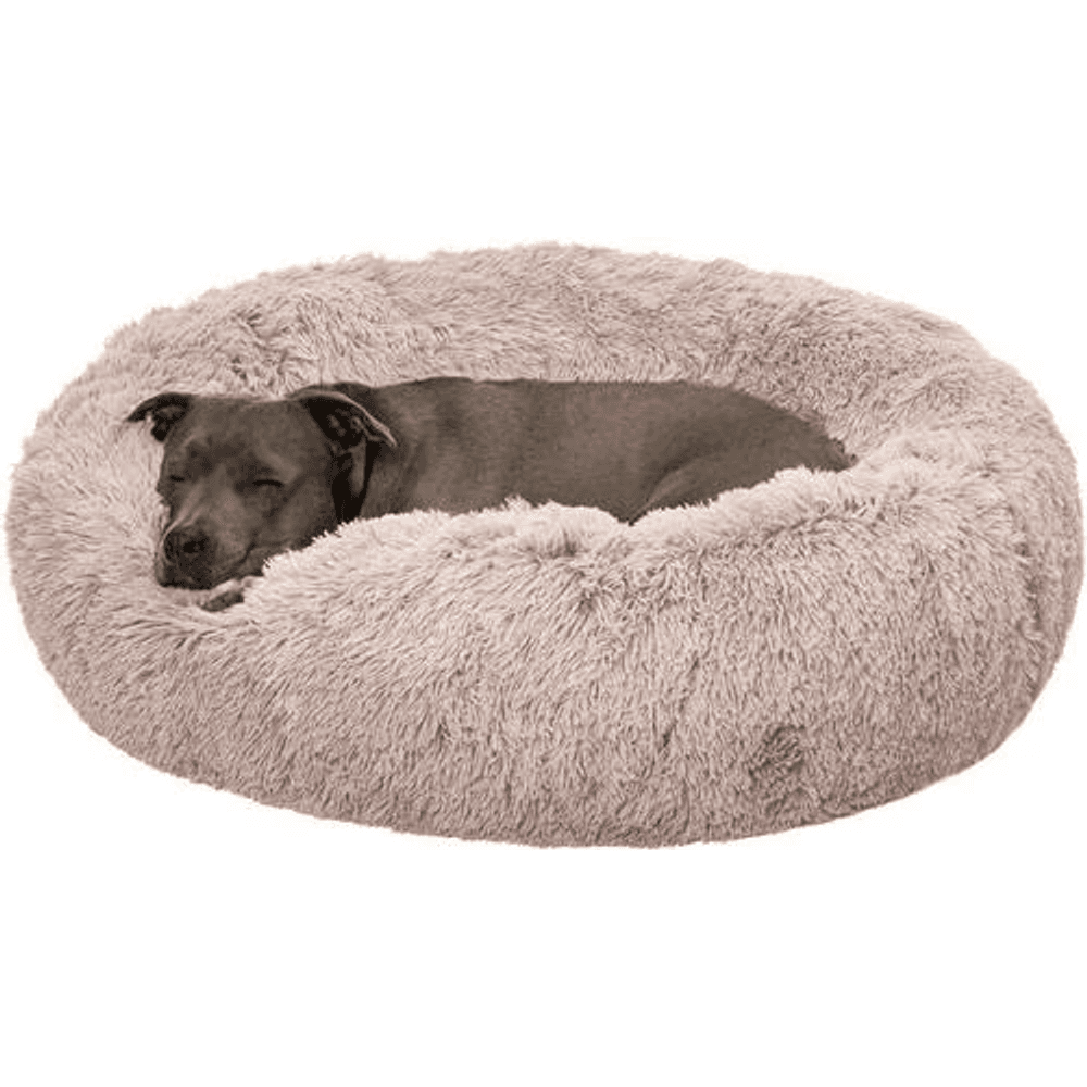 FurHaven Calming Cuddler taupe long-fur donut bolster bed with a dog curled up resting inside