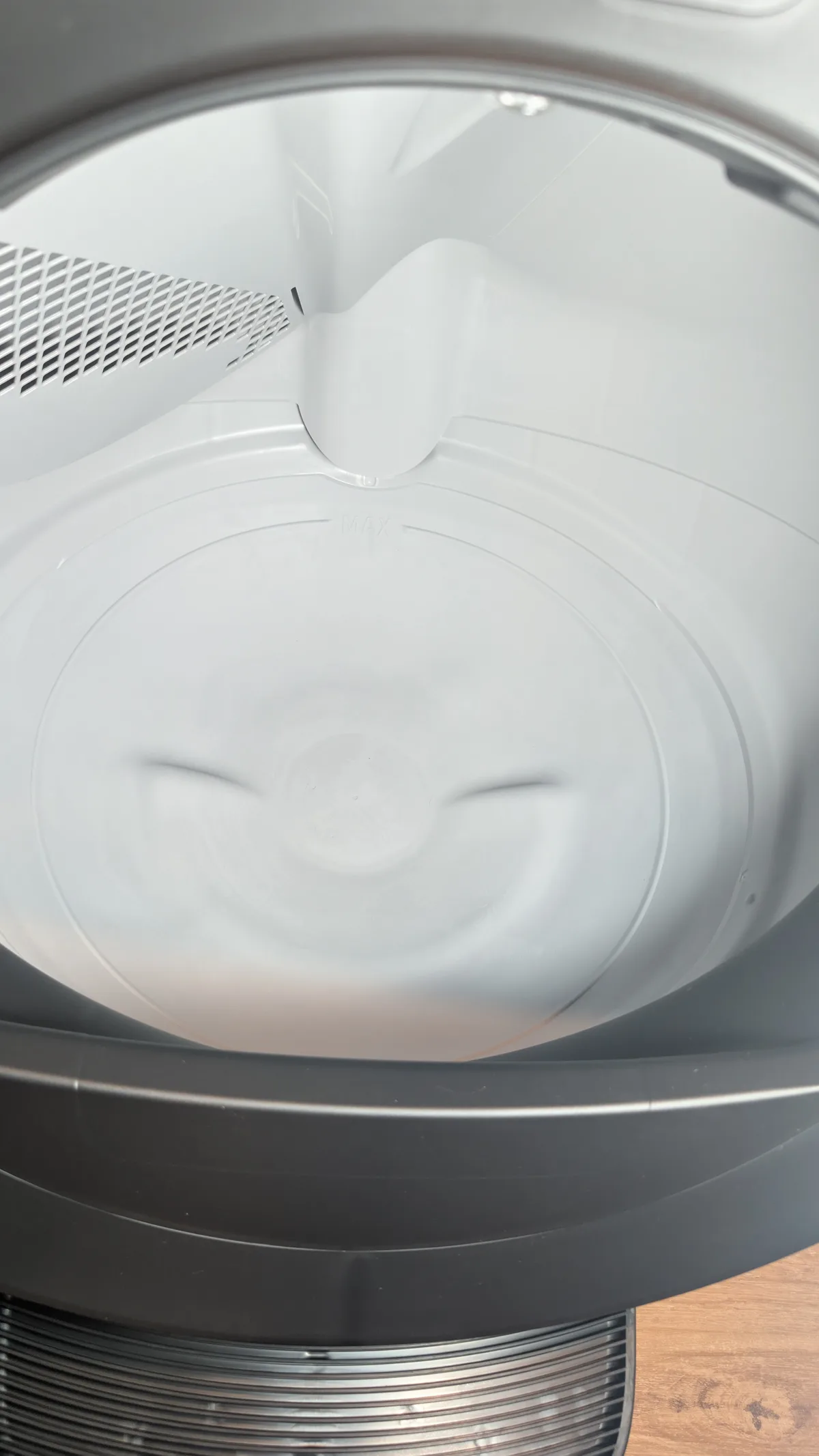 Empty Litter-Robot 5 Pro globe showing the molded litter fill line