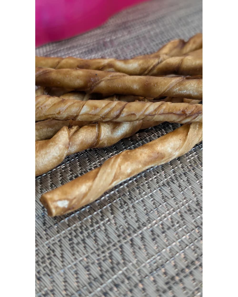 Close-up of ProHide Bully & Bacon Twist beef hide chews