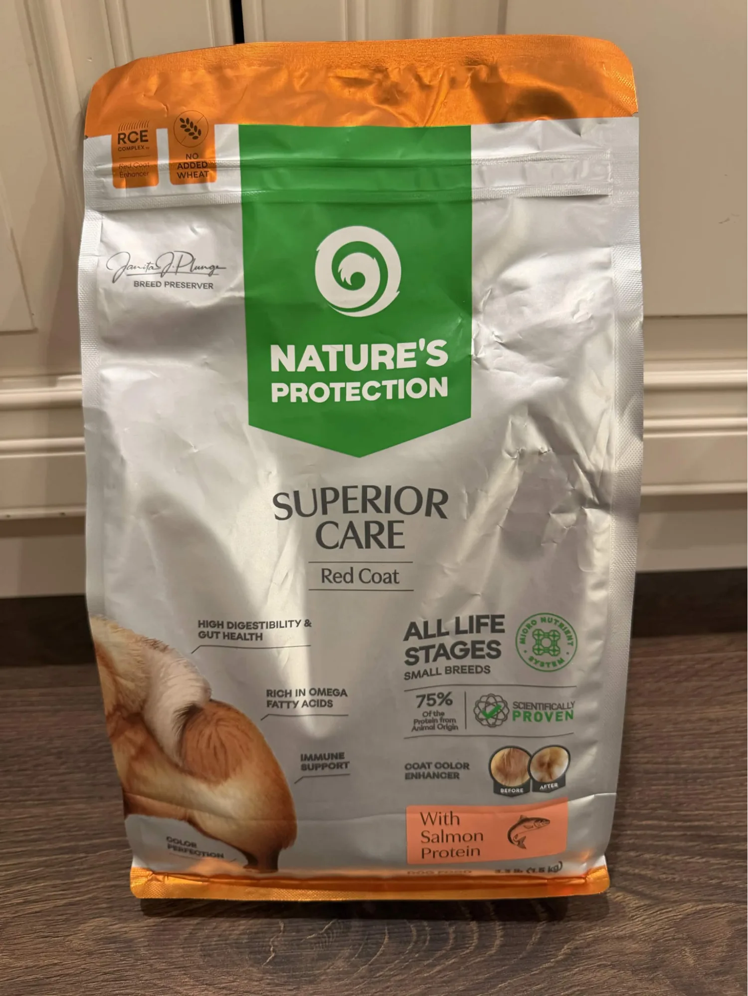 Front of a 3.3-pound bag of Nature's Protection Superior Care Red Coat Small & Mini Breeds dog food with salmon protein