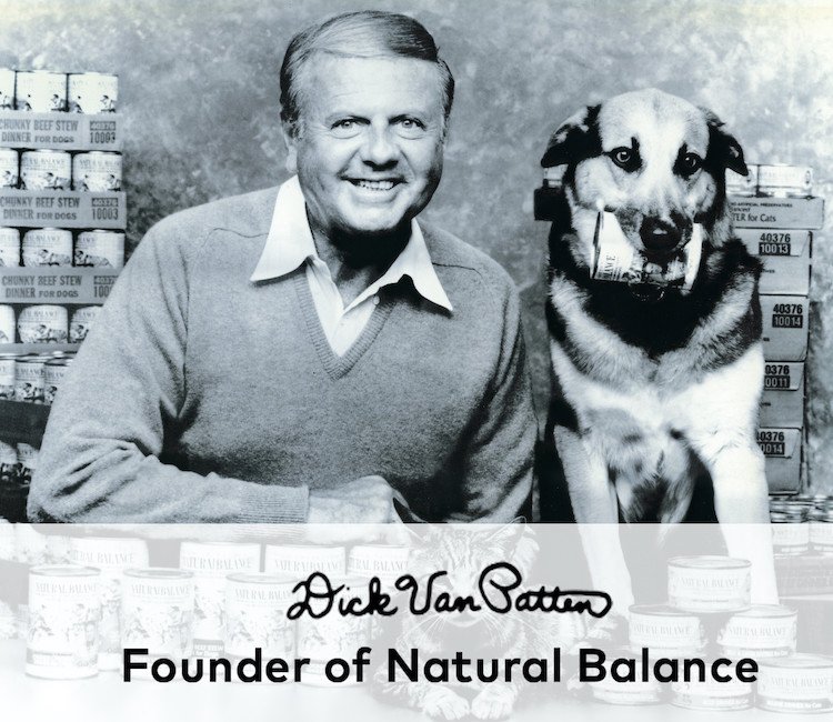 Photo of Dick Van Patten, founder of Natural Balance pet foods, and a dog with a can of Natural Balance in the dog's mouth