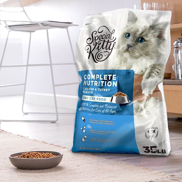 Photo of a bag of Special Kitty dry cat food, showing a bowl of the kibble in front of it