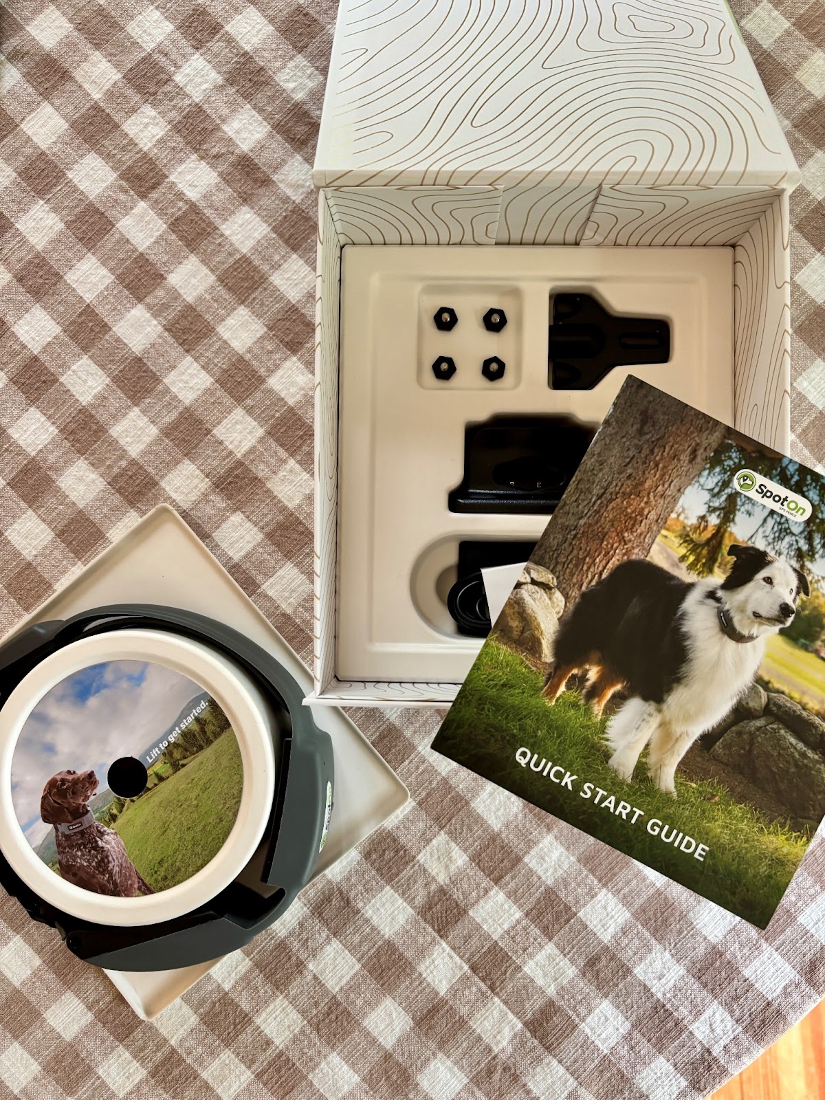 Spot On GPS Fence unboxing with collar, charging dock, and quick start guide ready for setup.